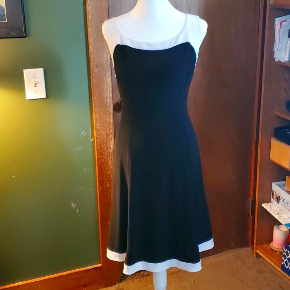 Chaps dress black with white trim. Pullover with bra strap snaps.